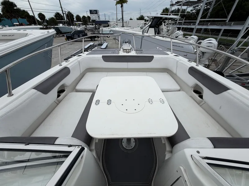 Slide: The Image of Interior view of a 2018 World Cat 255 DC boat with seating area. - 9