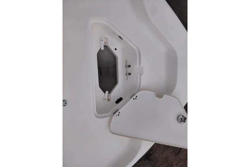 Slide: The Image of Open storage compartment on a 2018 Key West 230 Bay Reef boat. - 11