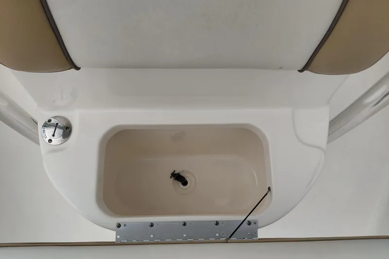 Slide: The Image of 2018 Key West 230 Bay Reef boat interior compartment detail. - 19