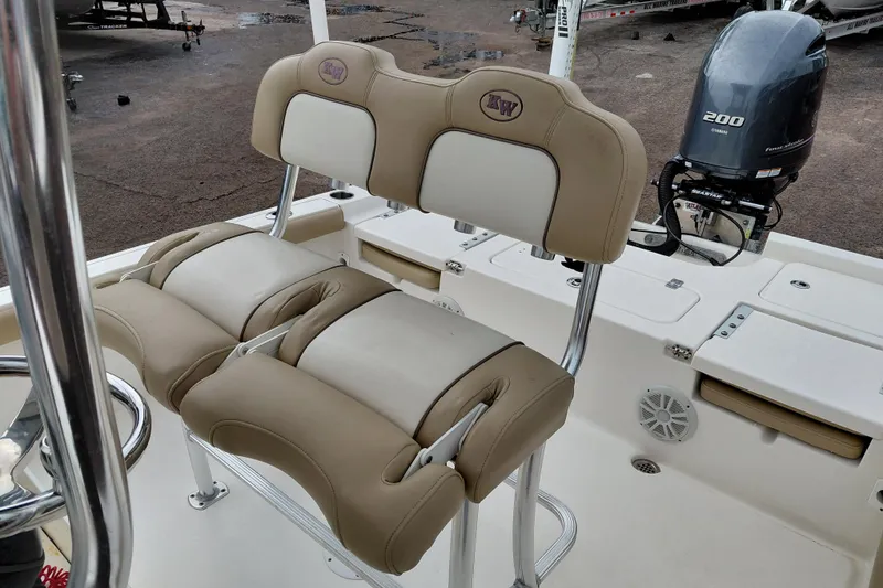 Slide: The Image of 2018 Key West 230 Bay Reef boat interior with dual seats and Yamaha 200 engine. - 27