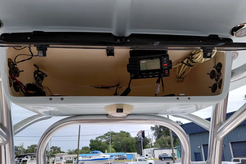 Slide: The Image of 2018 Key West 230 Bay Reef boat console with electronic equipment and wiring. - 35