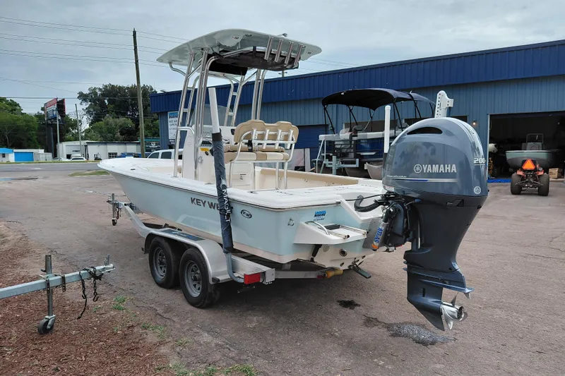 Slide: The Image of 2018 Key West 230 Bay Reef boat with Yamaha engine on trailer. - 5