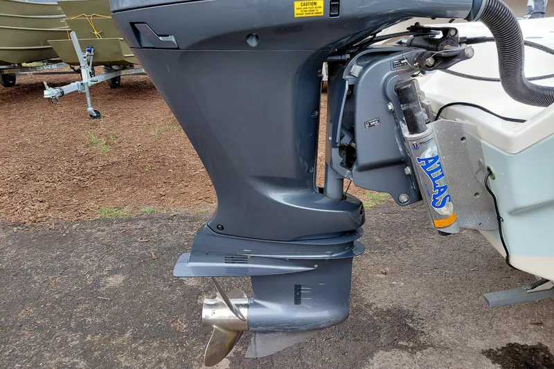 Slide: The Image of Outboard motor on a 2018 Key West 230 Bay Reef boat, featuring Atlas hydraulic jack plate. - 54