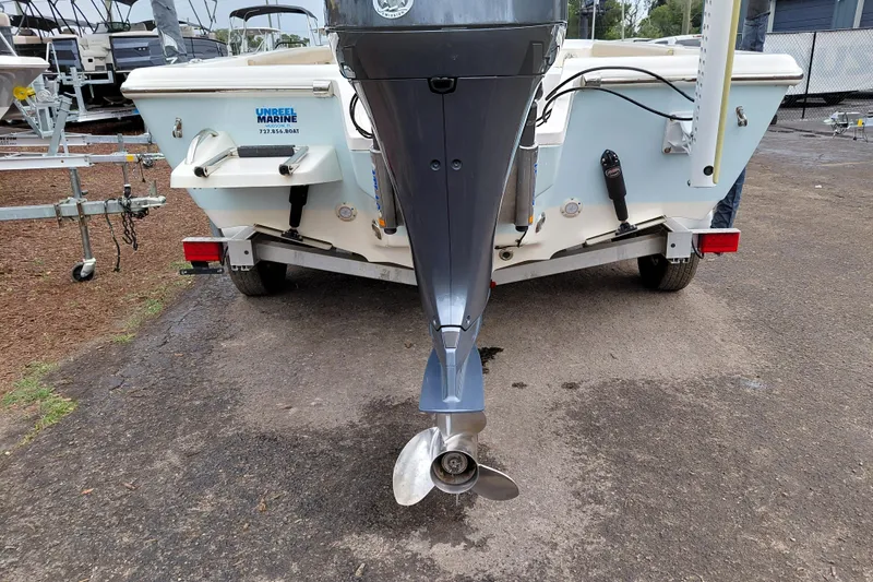 Slide: The Image of Rear view of a 2018 Key West 230 Bay Reef boat with outboard motor. - 55