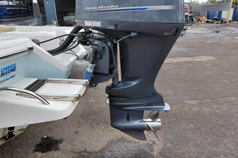 Slide: The Image of 2018 Key West 230 Bay Reef boat with four-stroke outboard motor. - 56