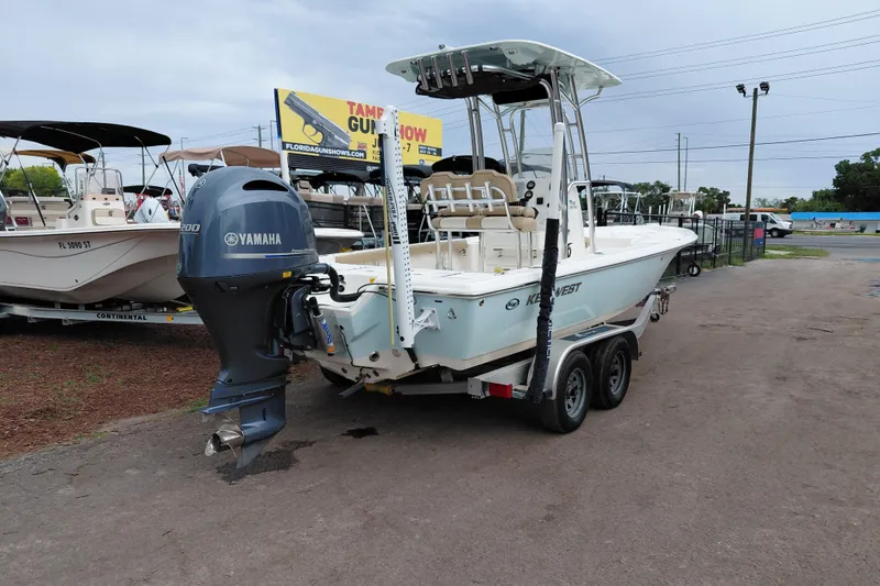 Slide: The Image of 2018 Key West 230 Bay Reef boat with Yamaha engine on trailer. - 7