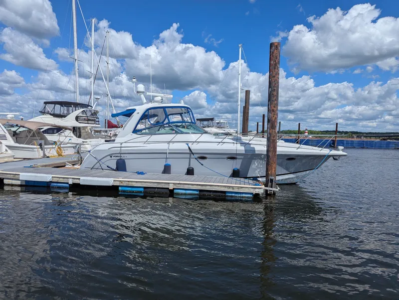 The Image of 2008 Formula PC yacht docked at marina under sunny skies. - 0
