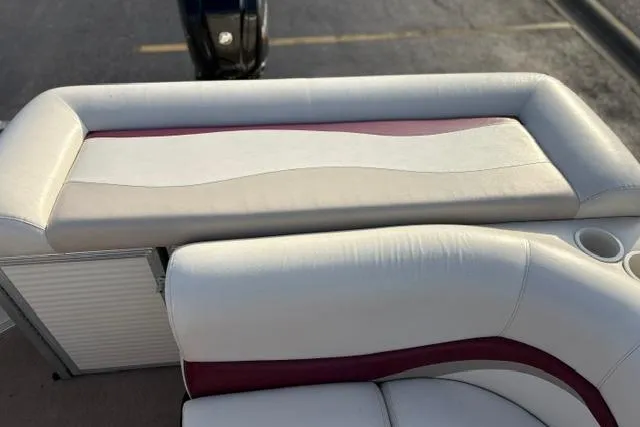 Slide: The Image of 2010 Sun Tracker Party Barge 21 Signature Series boat seating with cup holders. - 14