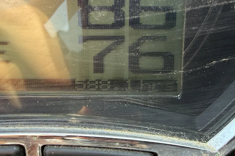 Slide: The Image of Close-up of a 2016 Axis A22 digital display showing numbers and data. - 15
