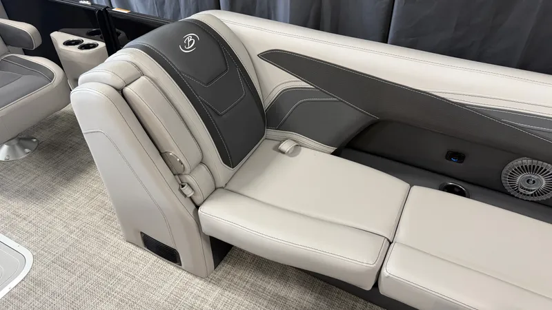 Slide: The Image of Interior of a 2027 Barletta CABRIO24QC with sleek, light gray upholstered seating. - 30