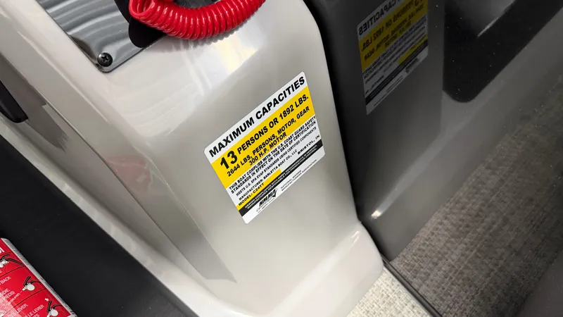 Slide: The Image of A sign shows the maximum capacity of 13 persons or 1814 kg. - 47