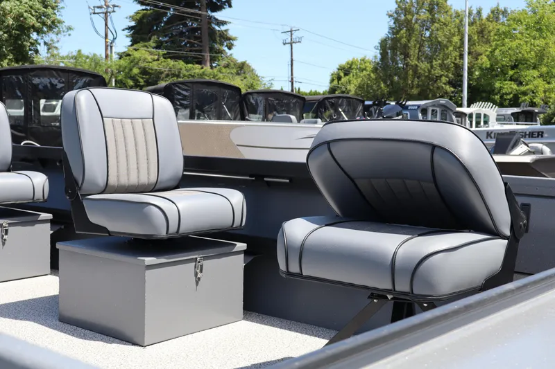Slide: The Image of 2026 Alumaweld Super Vee Pro 21 boat interior with gray cushioned seats. - 5