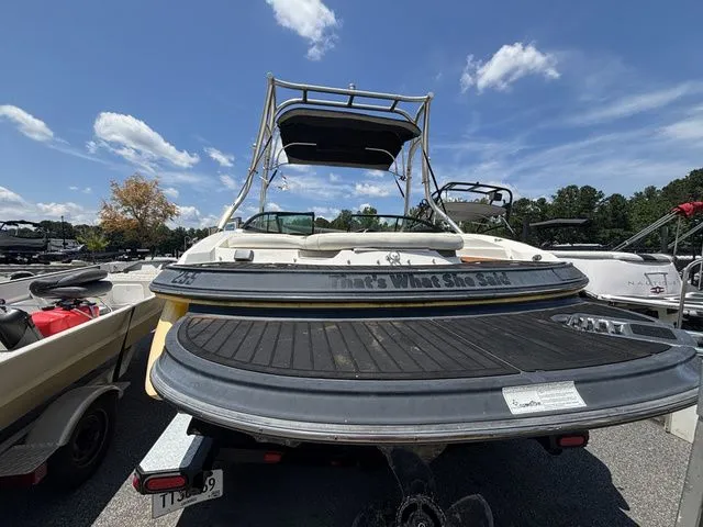Slide: The Image of 2012 Monterey 224 FS boat with Volvo Penta engine, rear view. - 12