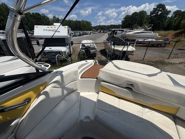 Slide: The Image of Interior view of a 2012 Monterey 224 FS BR boat at the marina. - 29