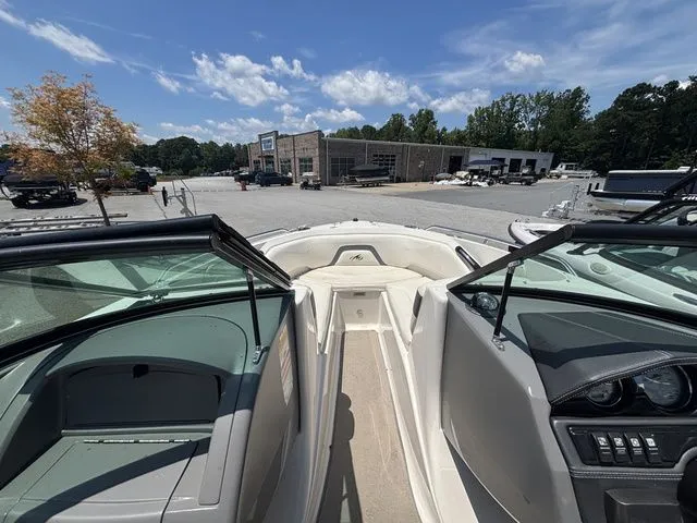 Slide: The Image of Interior view of a 2012 Monterey 224 FS BR boat on a parking lot. - 37