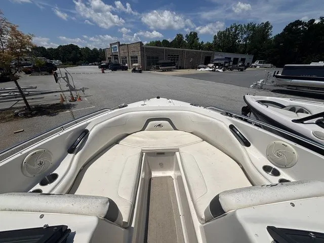 Slide: The Image of Interior view of a 2012 Monterey 224 FS BR boat on a parking lot. - 38