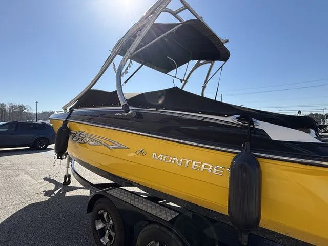 Slide: The Image of Yellow 2012 Monterey 224 FS boat on trailer. - 4