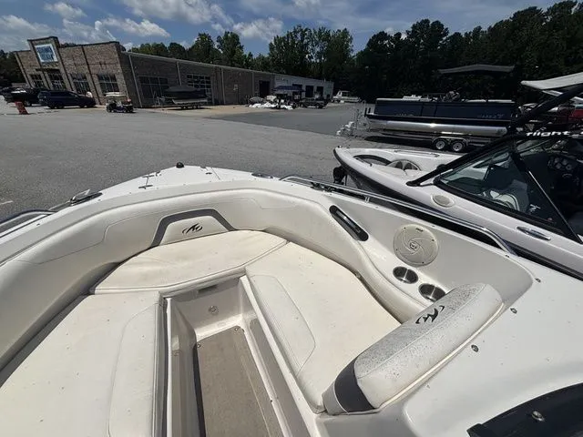 Slide: The Image of 2012 Monterey 224 FS BR boat with Volvo Penta engine in parking lot. - 40