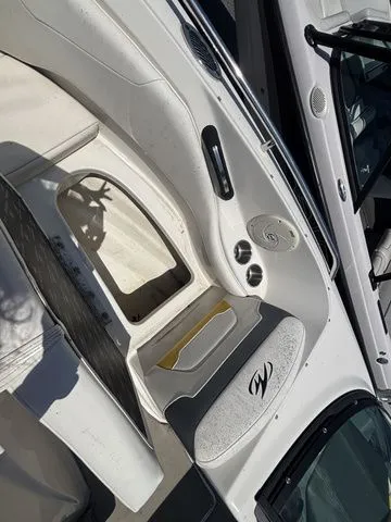Slide: The Image of Interior of a 2012 Monterey 224 FS BR boat, white seating. - 43