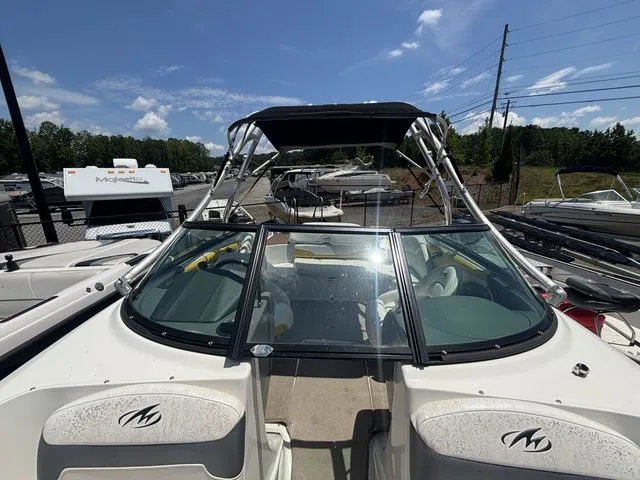 Slide: The Image of 2012 Monterey 224 FS boat with Volvo Penta engine, front view. - 47