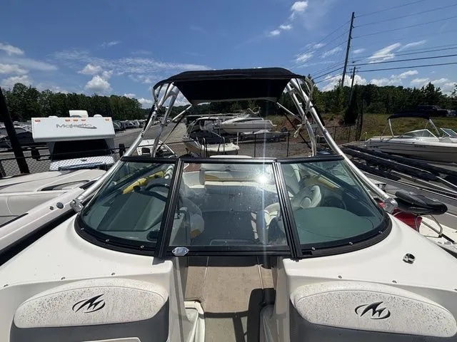 Slide: The Image of 2012 Monterey 224 FS boat with Volvo Penta engine, front view. - 48