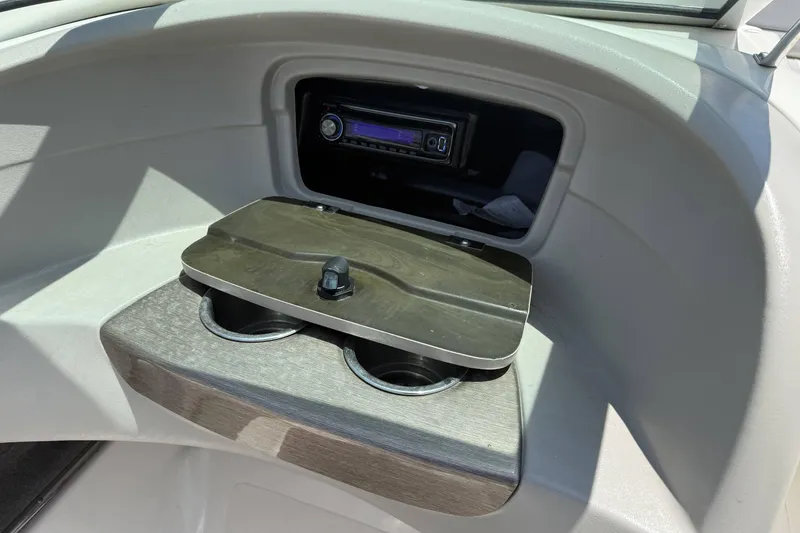 Slide: The Image of Boat interior with stereo system and cup holders, Bryant 233 model, 2010. - 14