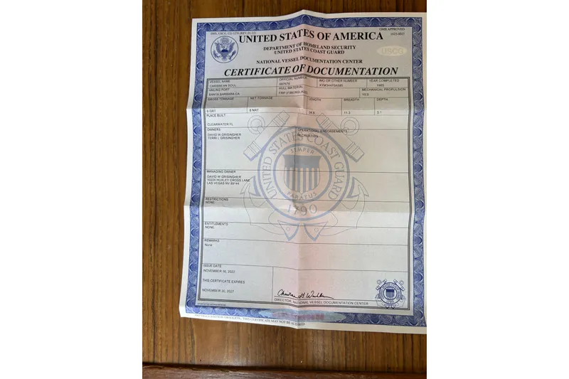 Slide: The Image of Certificate of Documentation for 1984 Irwin 34 sailboat, issued by U.S. Coast Guard. - 9