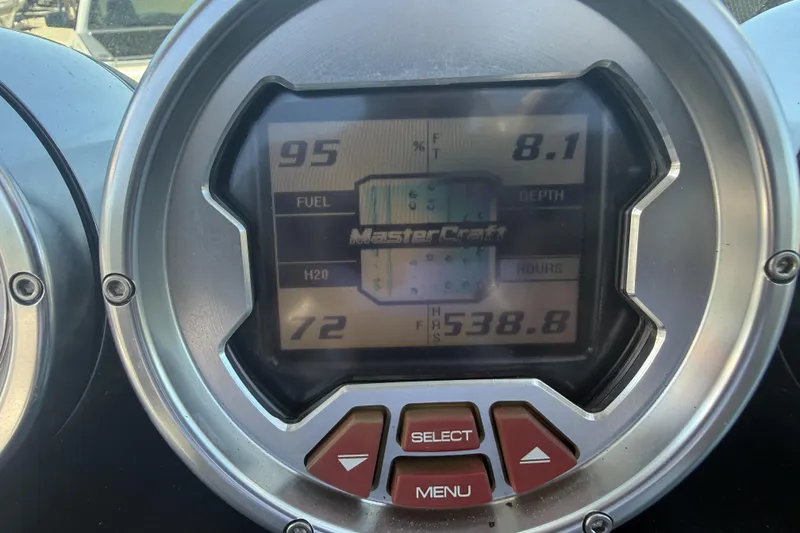 Slide: The Image of Dashboard of a 2008 MasterCraft X-45 boat showing fuel, depth, and hours. - 16