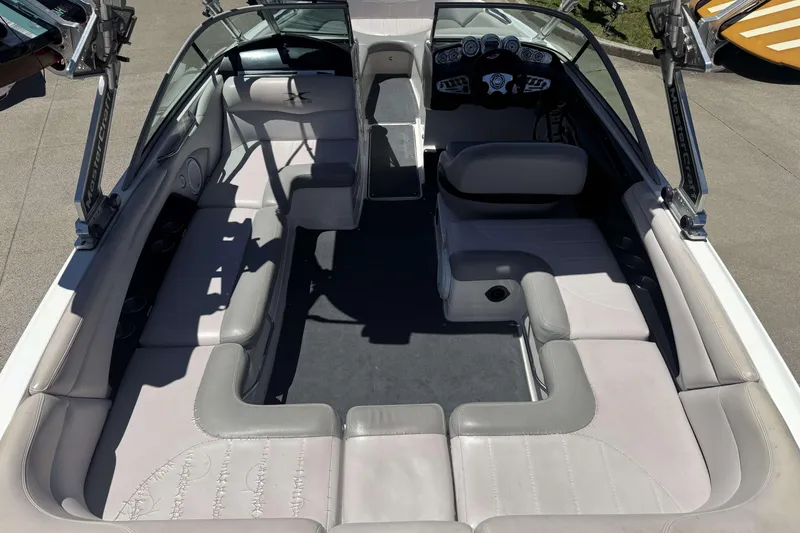 Slide: The Image of 2008 MasterCraft X-45 boat interior with spacious seating and modern dashboard. - 25