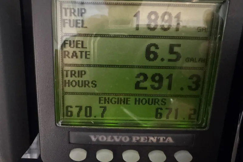 Slide: The Image of Volvo Penta display showing trip fuel, fuel rate, trip hours, and engine hours for 2007 Tiara Yachts 4300 Sovran. - 19