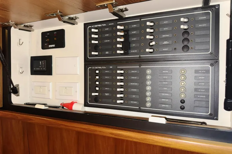 Slide: The Image of Electrical control panel on a 2007 Tiara Yachts 4300 Sovran boat. - 35