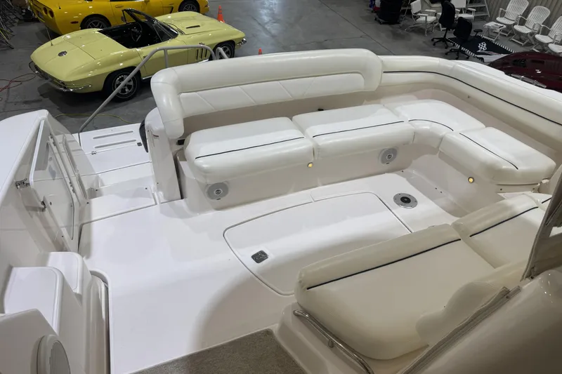 Slide: The Image of 2007 Tiara Yachts 4300 Sovran interior with white seating, showcasing luxury design. - 9