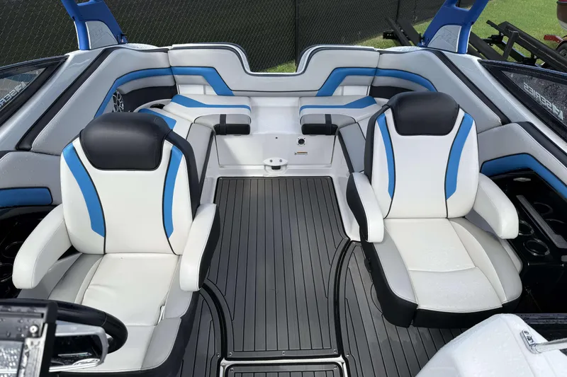 Slide: The Image of Dashboard of 2018 Yamaha Boats 242X E-Series showing trip info and engine hours. - 10