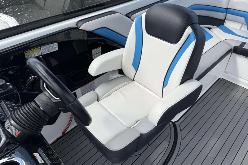 Slide: The Image of 2018 Yamaha Boats 242X E-Series interior with sleek seating and modern design. - 12