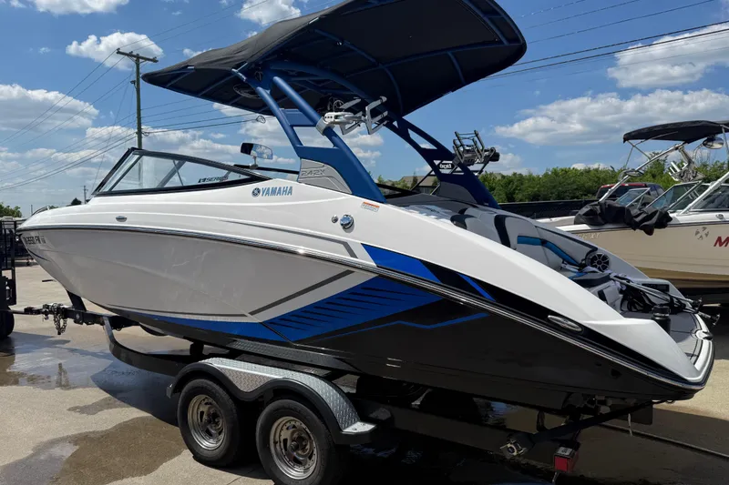 Slide: The Image of 2018 Yamaha Boats 242X E-Series interior with sleek seating and modern design. - 3