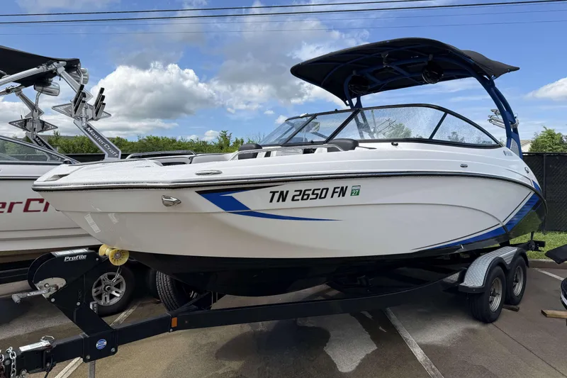Slide: The Image of Interior of 2018 Yamaha Boats 242X E-Series with stylish seating and modern design. - 5
