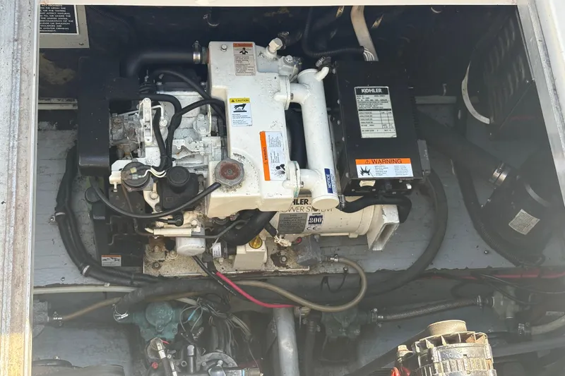 Slide: The Image of Engine compartment of a 2000 Monterey 322 Cruiser with Kohler generator. - 50