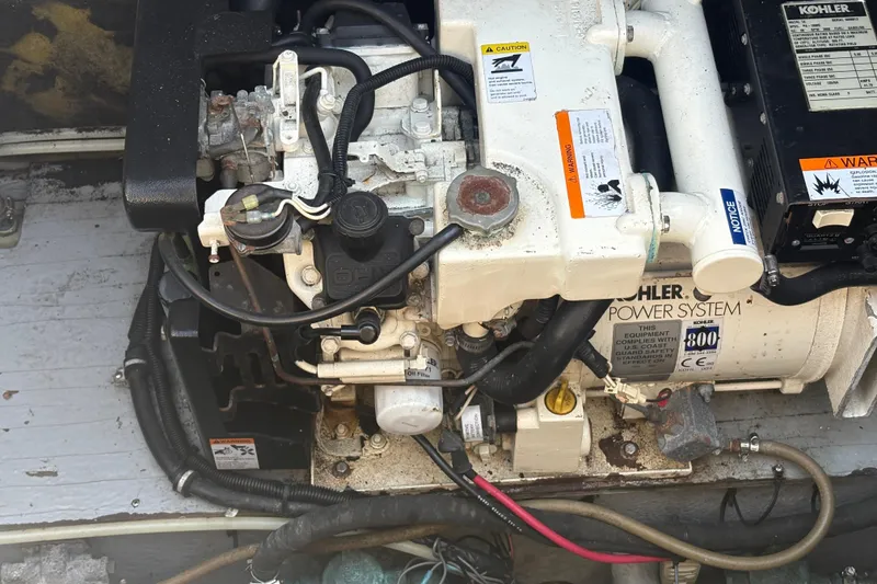 Slide: The Image of Engine compartment of a 2000 Monterey 322 Cruiser with Kohler power system. - 51