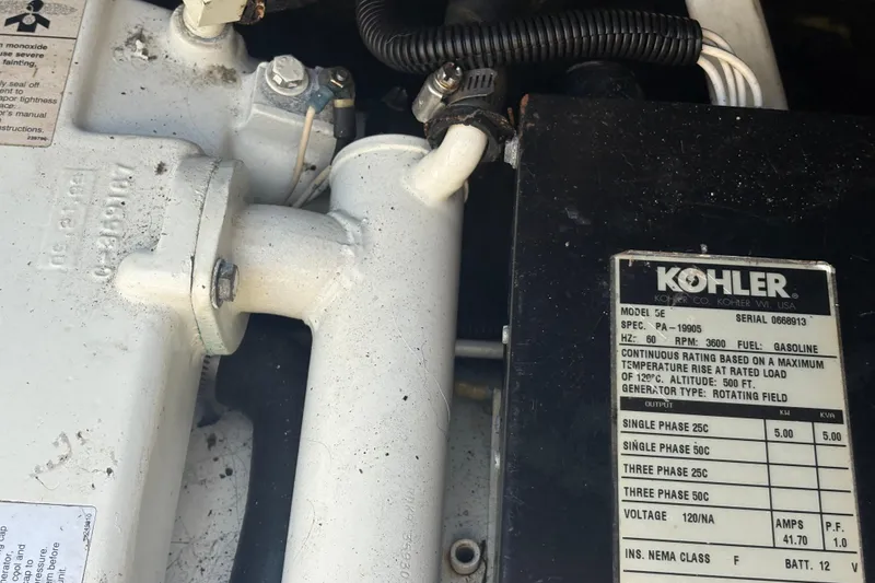 Slide: The Image of Close-up of a Kohler generator label in a 2000 Monterey 322 Cruiser boat. - 53