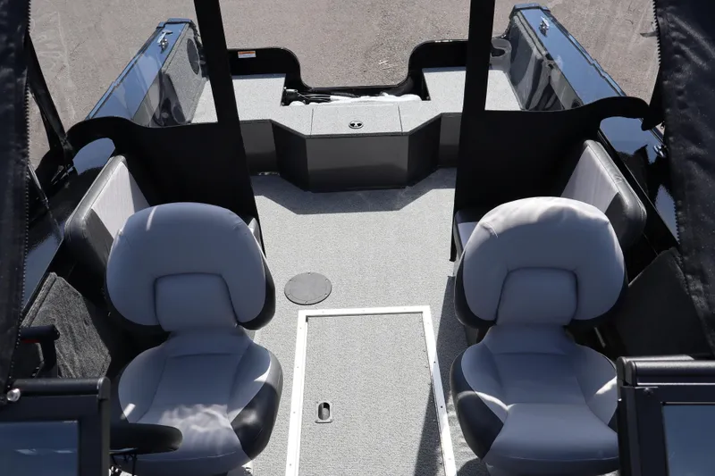 Slide: The Image of 2026 Smoker Craft Osprey 172 boat interior with two gray seats and spacious layout. - 24