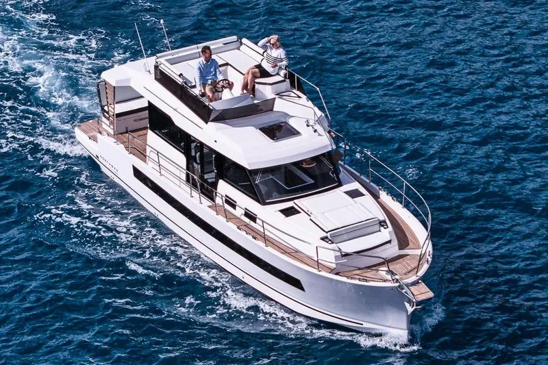 The Image of 2025 Northman 1300 yacht cruising on open blue water. - 0