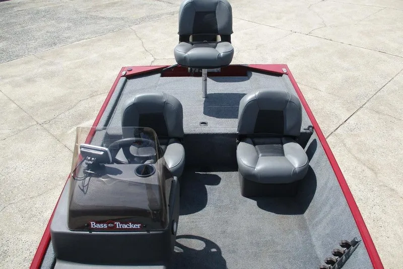 Slide: The Image of 2022 Tracker Bass Tracker Classic XL boat interior with seating and steering console. - 6