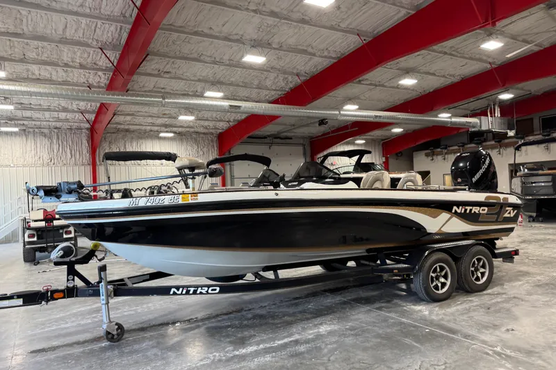 Slide: The Image of 2014 Nitro ZV21 boat on trailer in indoor storage facility. - 4