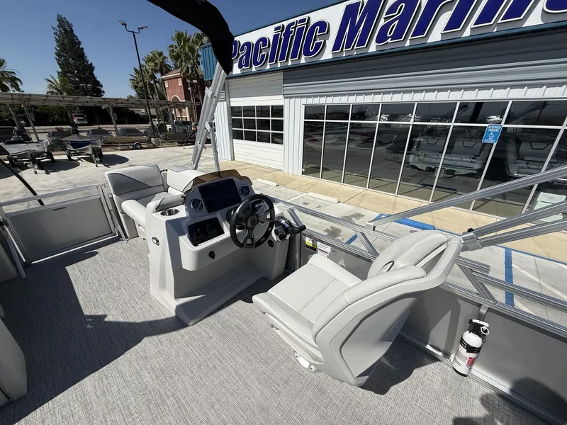 Slide: The Image of 2026 Avalon Venture Versatile boat with 60HP Mercury engine at Pacific Marine. - 10