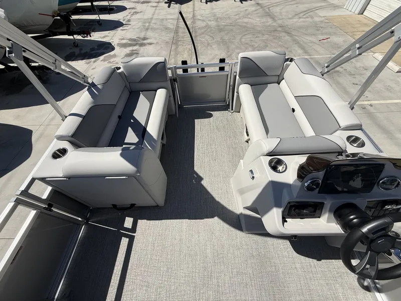 Slide: The Image of Interior of 2026 Avalon Venture Versatile with gray seating benches. - 14