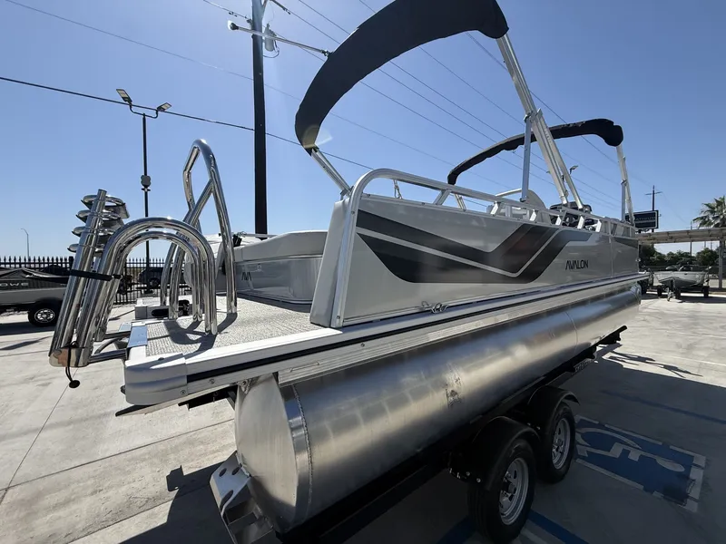 Slide: The Image of 2026 Avalon Venture Versatile pontoon boat with 60HP Mercury engine. - 5
