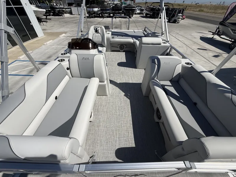 Slide: The Image of Interior of 2026 Avalon Venture Versatile with gray seating benches. - 9