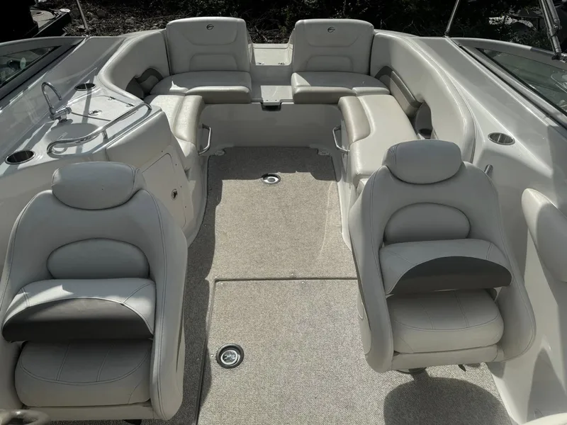 Slide: The Image of Interior of a 2008 Crownline Bowrider 270 BR with gray seating. - 9