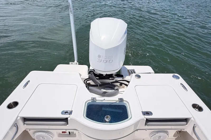 Slide: The Image of 2017 Everglades 243 Center Console boat with Yamaha 300 engine on water. - 39