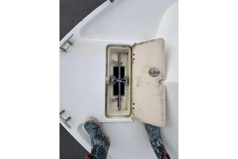 Slide: The Image of Open anchor locker on 2003 Parker 2120 Sport Cabin boat deck. - 18